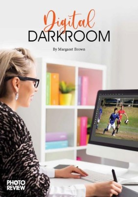 Book cover with an image of a woman editing a photograph on a computer.