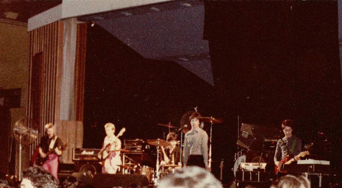 Four band member of The Lemmings performing onstage at Festival Hall