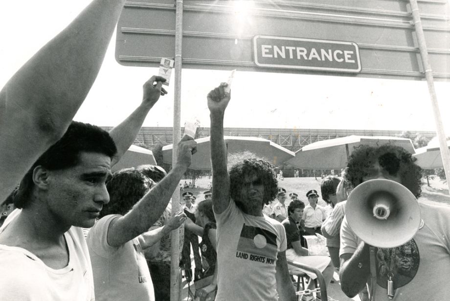 Protestors at QEII Stadium for one of the main events of the XII Commonwealth Games