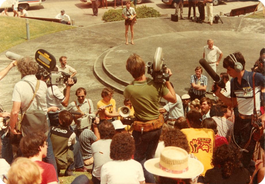 The media watching Kath Walker make a speech