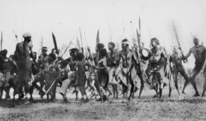 Decorated Aboriginal men dancing on Palm Island, ca. 1933