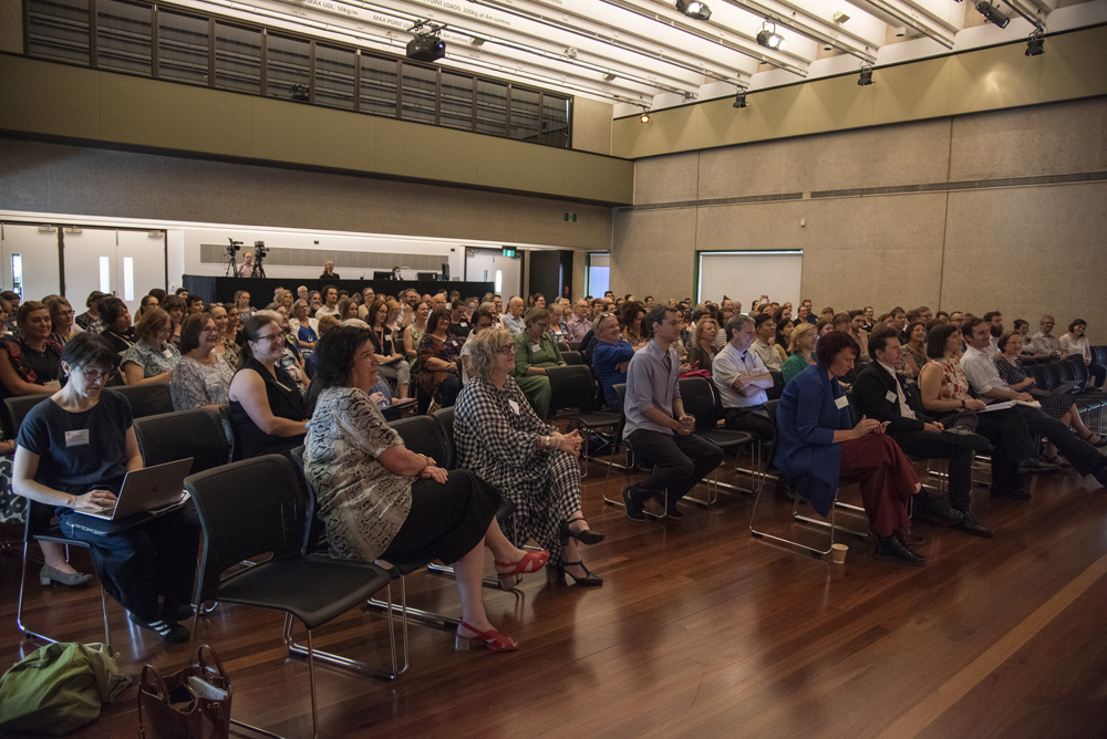 Audience taking notes at Making Meaning