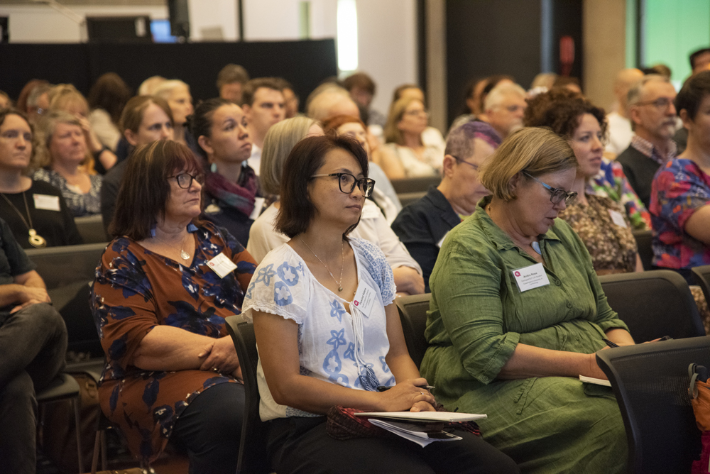 Audience taking notes at Making Meaning