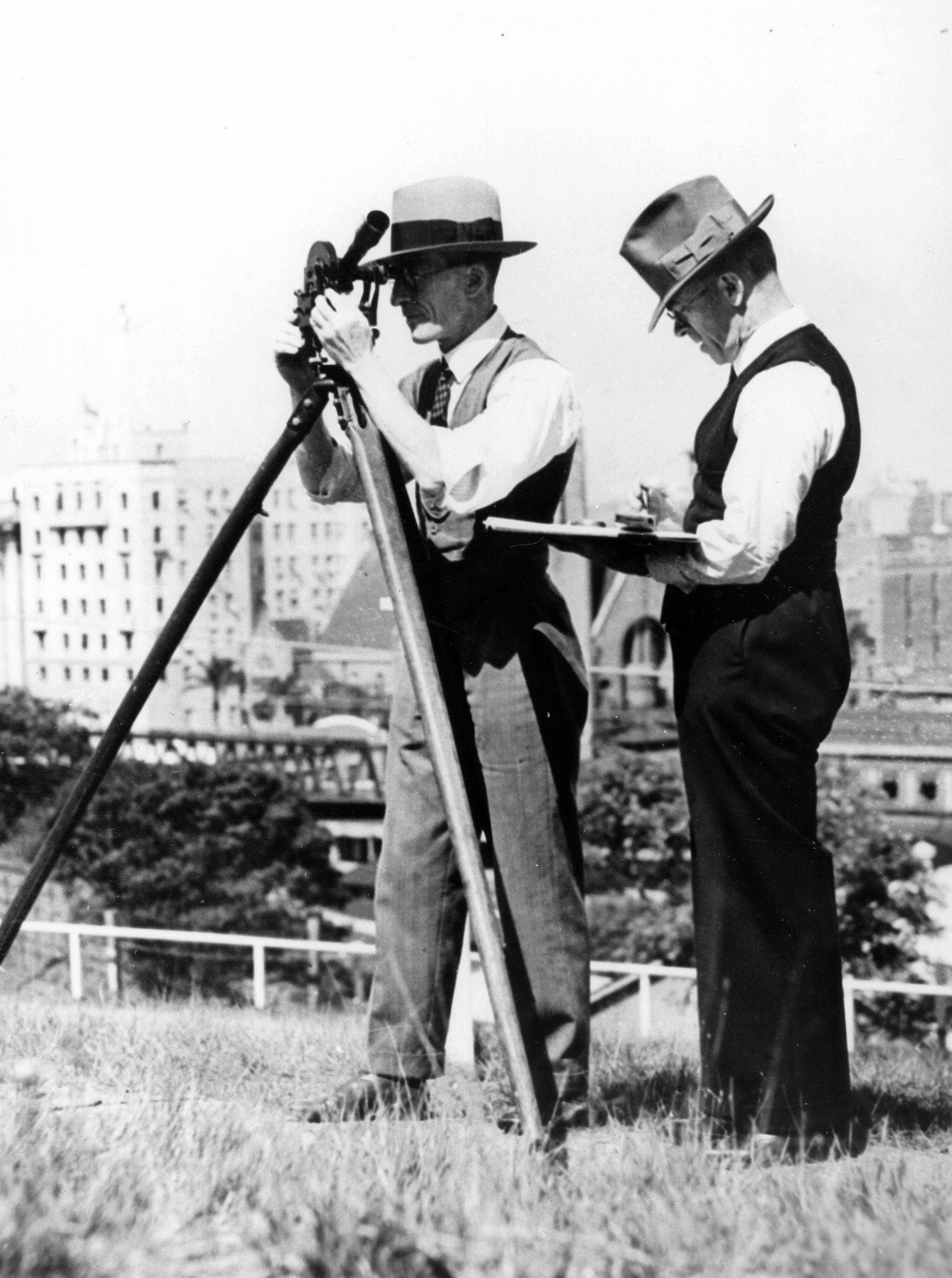 Two meteorologists registering information using their recording equipment, ca.1937 Two meteorologists registering information using their recording equipment ca1937