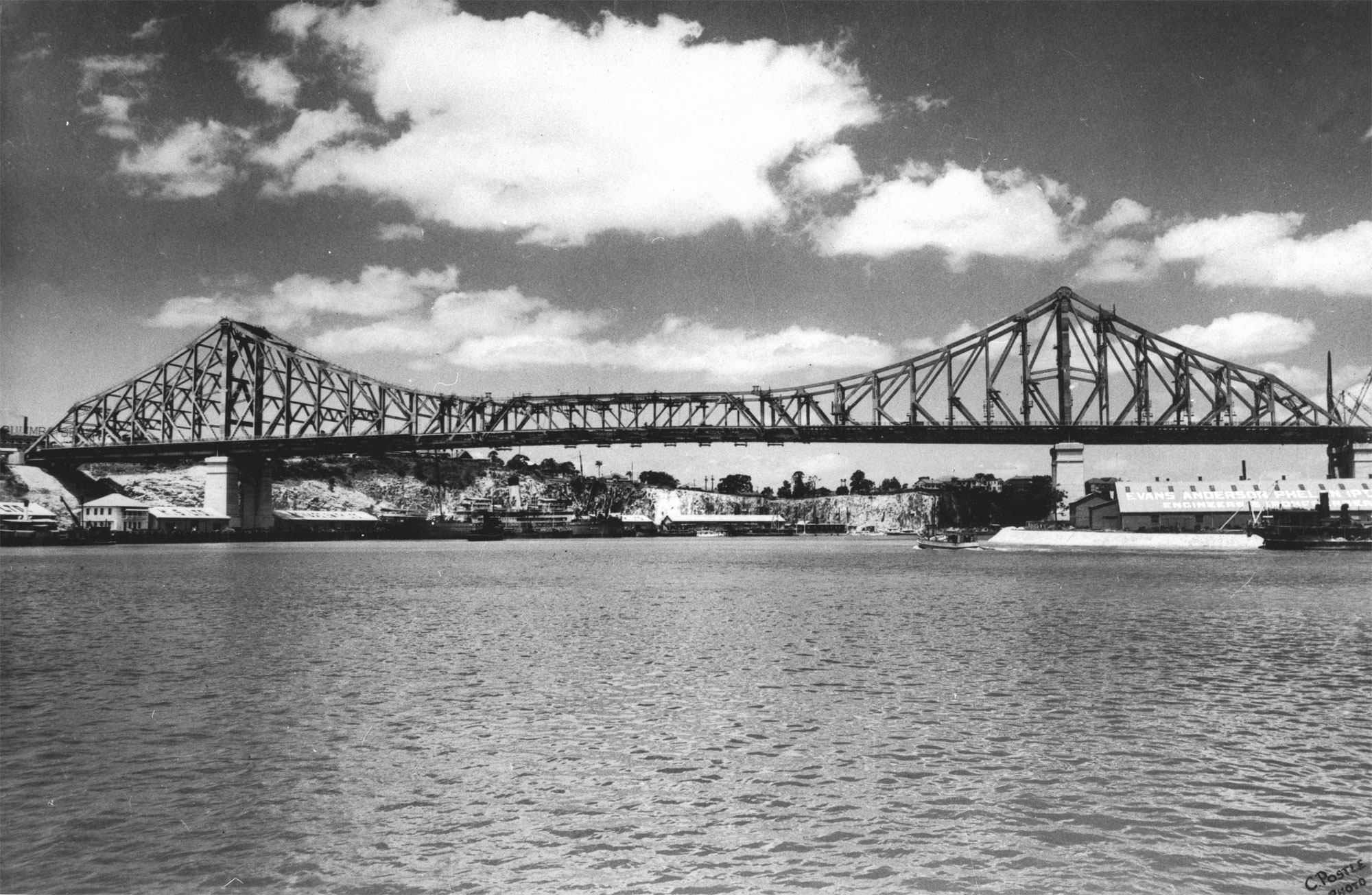 Brisbane's Story Bridge 1940 Brisbanes Story Bridge 1940 The 281 metre cantilever bridge was built between19351940 constructed by Evans Deakin - Hornibrook Pty Ltd The premises of Evans Anderson Phelan Pty Ltd Engineers at Kangaroo Point are visible on the right The New Farm cliffs can be seen in the background The bridge connected Fortitude Valley and the southside suburbs It is heritage listed and now carries 30 million cars per year 16 bridges cross the river but the Story Bridge remains the grandfather of them all