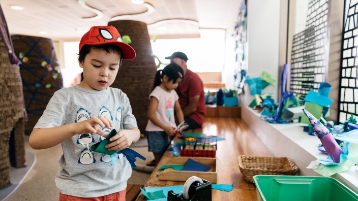 Boy playing with craft