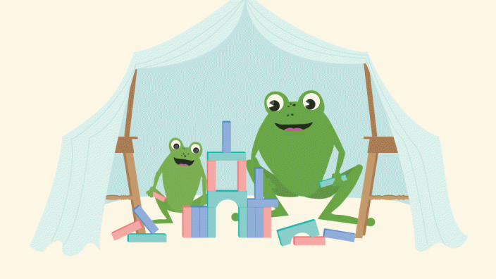 Two frogs reading books inside a cubby house