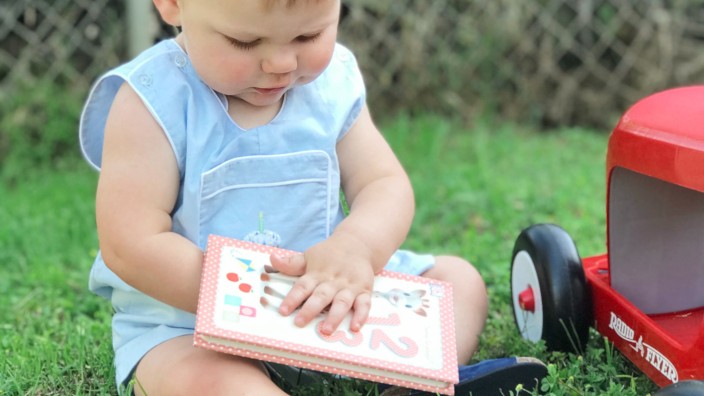Toddler with book 
