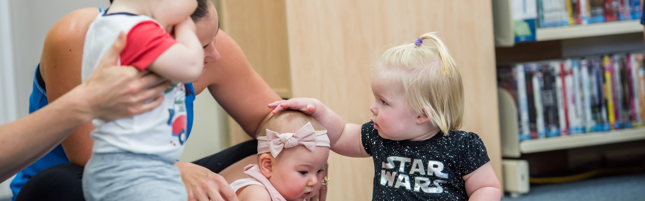 Babies attend a Baby Play session at a library in Mackay