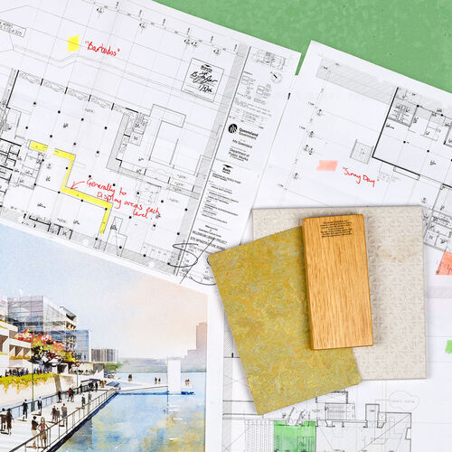 Flat lay of architectural plans, drawings and items from the Millennium Library Project
