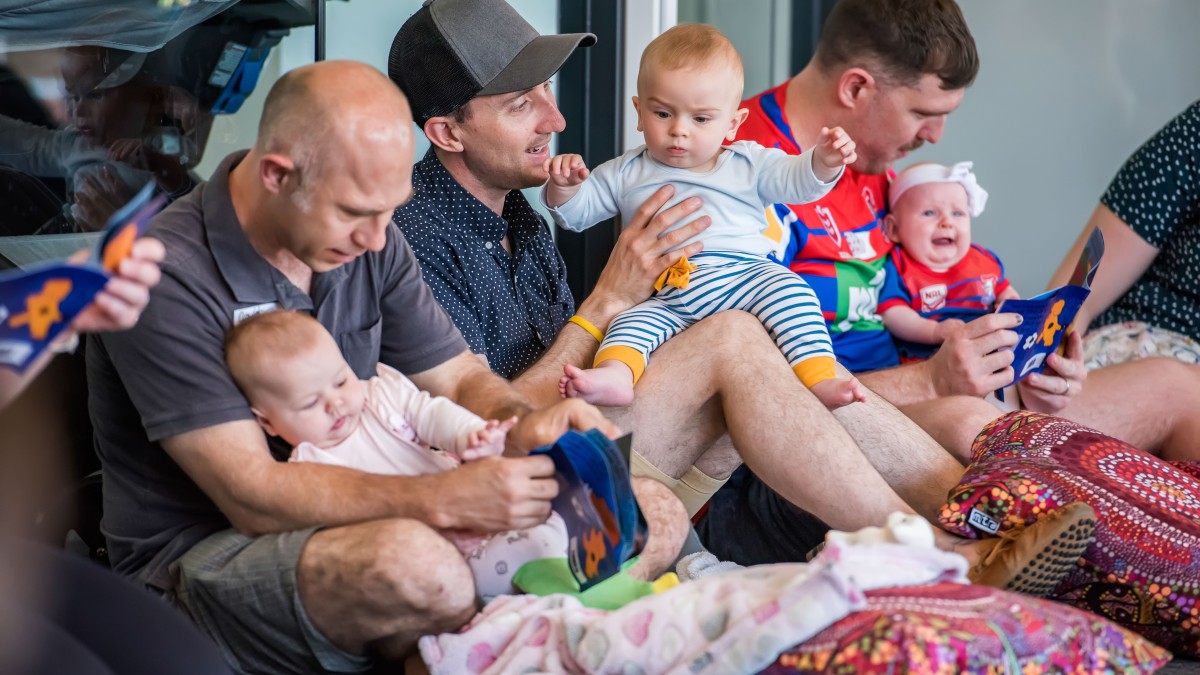 Fathers and babies attending a baby play session