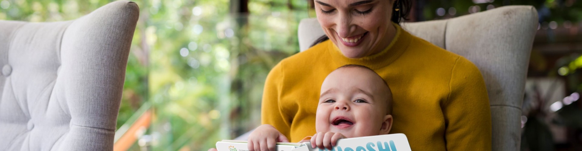 Mother and daughter reading Shoosh board book