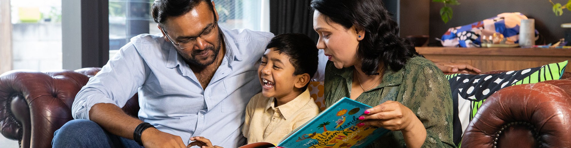 Family reading to child
