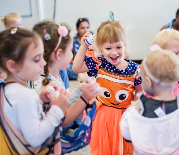 Preschoolers singing and dancing at a First 5 Forever session