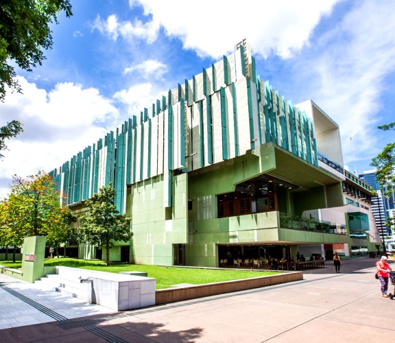 Exterior view of the State Library building during the day.