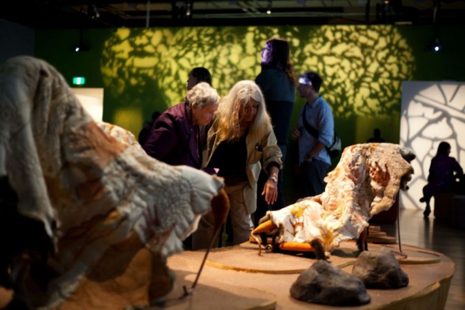 Aunty Joyce Watson and Aunty Dawn Daylight looking at the Gold Coast Cloaks. Photo by LaVonne Bobongie Wall