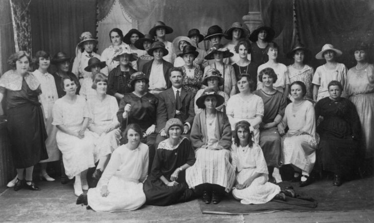 Large group of 1920s women sitting with mayor