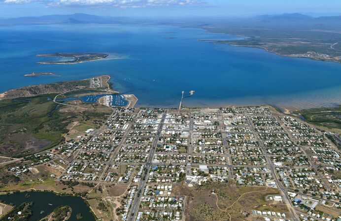 Bowen beachside suburbs from the air overlooking Coral Sea 