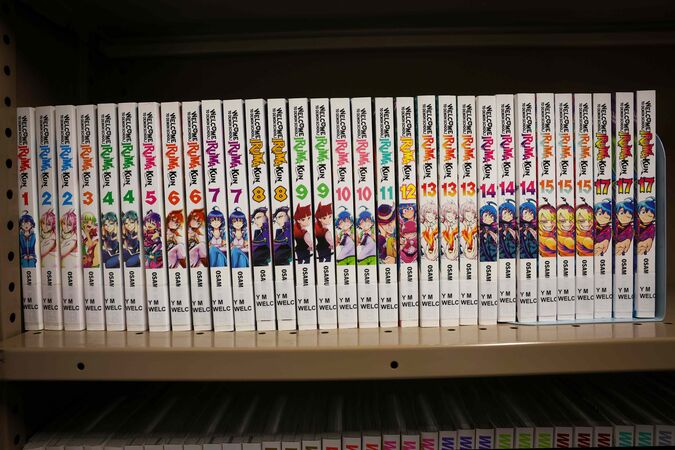 Manga titles from the Iruma-kun series on a shelf