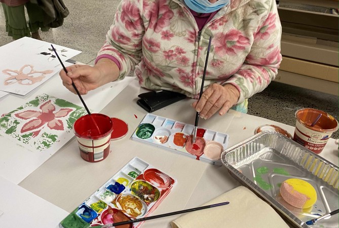 Colleen expanding her existing practice, working with laser cut stencils of her flower photography