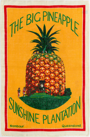 Orange tea towel with an illustration of The Big Pineapple