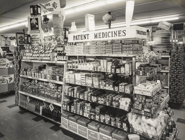 Patent medicines and kitchen items at the Chermside Cash and Carry store, 1957