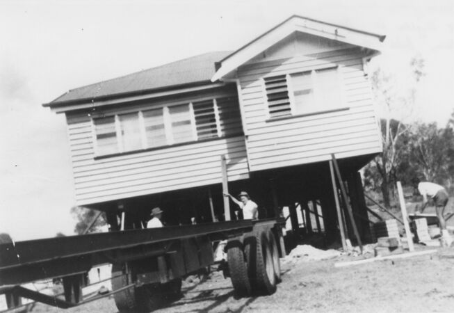 Grace and Herb Beecher house being removed from 18 Wighton St, Nashville, to Beecher Farm, Bald Hills Road, Sandgate.