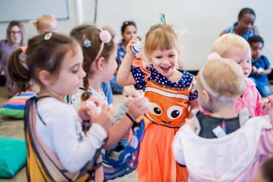 Preschoolers singing and dancing at a First 5 Forever session