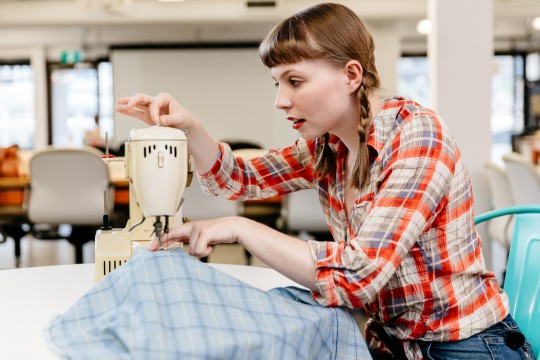 Teenager sewing