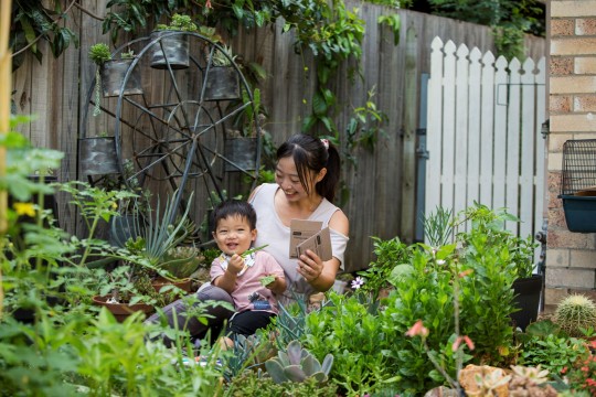 Mother and son in garden together