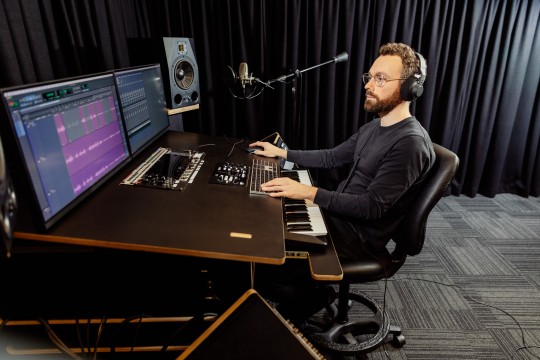 Person using the SLQ Recording Studio