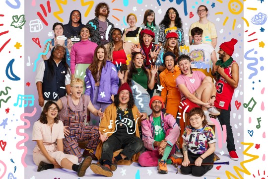A group of musicians in bright clothing smiling and posing for the camera with colourful illustrations drawn on the digital image