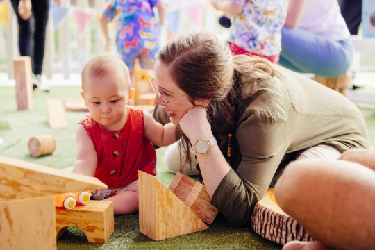 Parents playing with baby