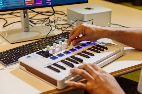 A photo of someone using a midi keyboard