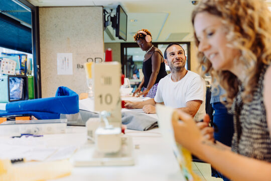 A photo of people sewing at The Edge