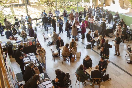 Teachers network on Queensland Terrace at 2025 Curriculum Connect Symposium