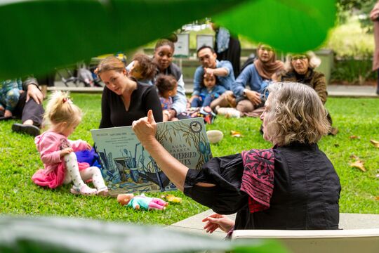 Children and families at a book reading