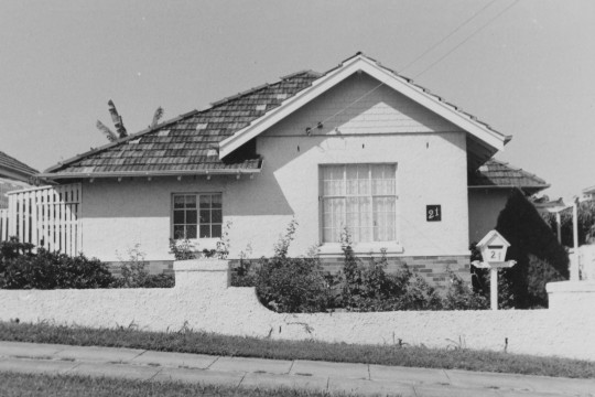 Black and white photo of single level house in Newmarket
