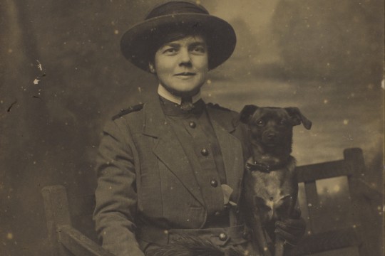 Studio portrait of Nurse Constance Keys with one of her pet dogs, ca. 1918, John Oxley Library, State Library of Queensland, Image 30674-0005-0051 Thumbnail