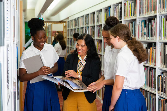 Surge Media. Students utilising onsite resources at State Library in a research experience.