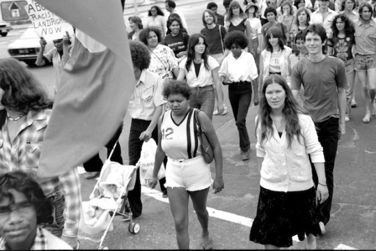 Aboriginal people and supporters marching in a land rights protest at the intersection of Grey and Melbourne Streets in South Brisbane in September 1982. 