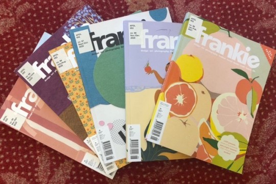 Photo of six Frankie magazines fanned out on carpet