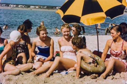 Old still of people on the beach