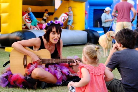 Danibelle performing to children