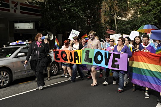  Woman with megaphone during march at Marriage Equality Rally in Brisbane 2011