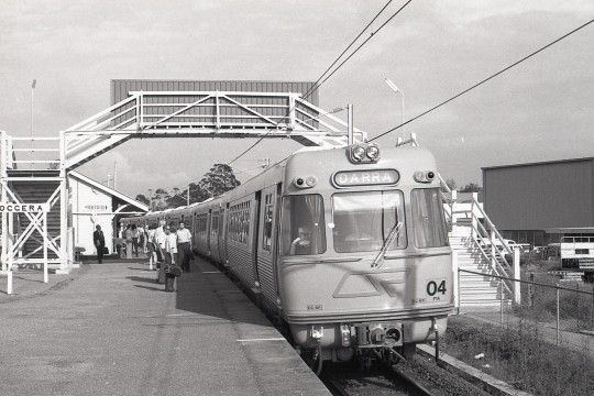 Electric train Number 04 loading passengers at Enoggera station 