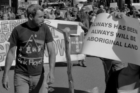 Protestors marching Melbourne St South Brisbane March 2012