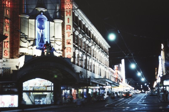 Christmas lights and decorations on the front of McWhirters in Brunswick Street, Fortitude Valley, 1962
