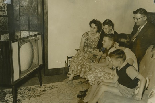 Ginn family gather around to watch television in Brisbane, Queensland 1959. In copyright. John Oxley Library, State Library of Queensland. Neg 68711 