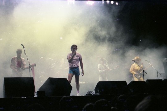 original line up of Skyhooks performing on stage at the Noosa Aussie Hop 1983